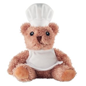 Orsacchiotto di peluche in poliestere vestito da chef con cappello e grembiule bianchi. Occhi, naso e bocca ricamati.